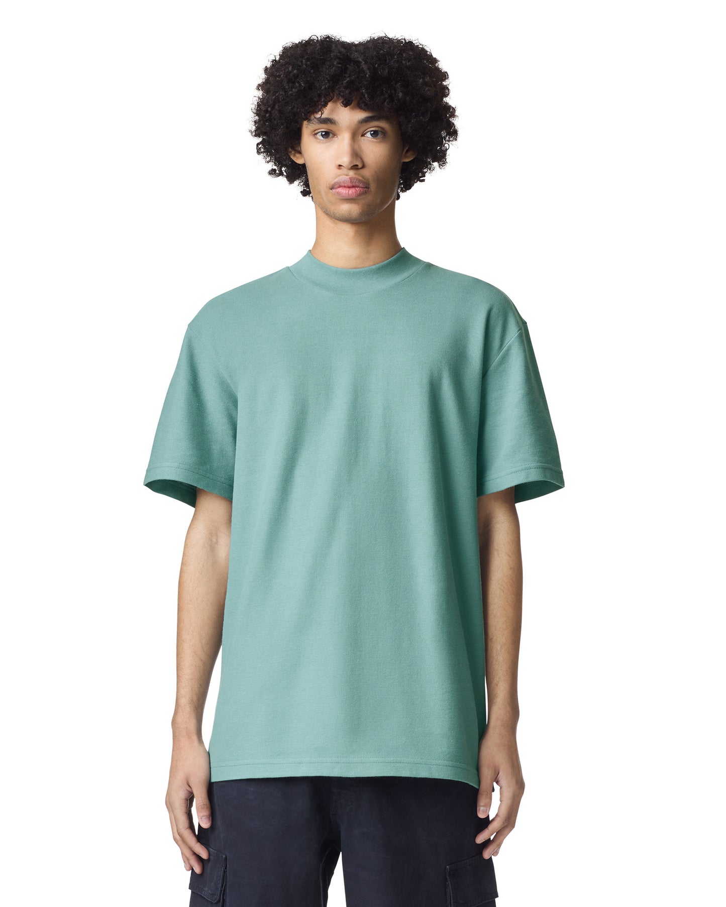 Model wearing American Apparel® 1PQ Mockneck T-shirt in Arctic, light teal color with relaxed fit and short sleeves-arctic