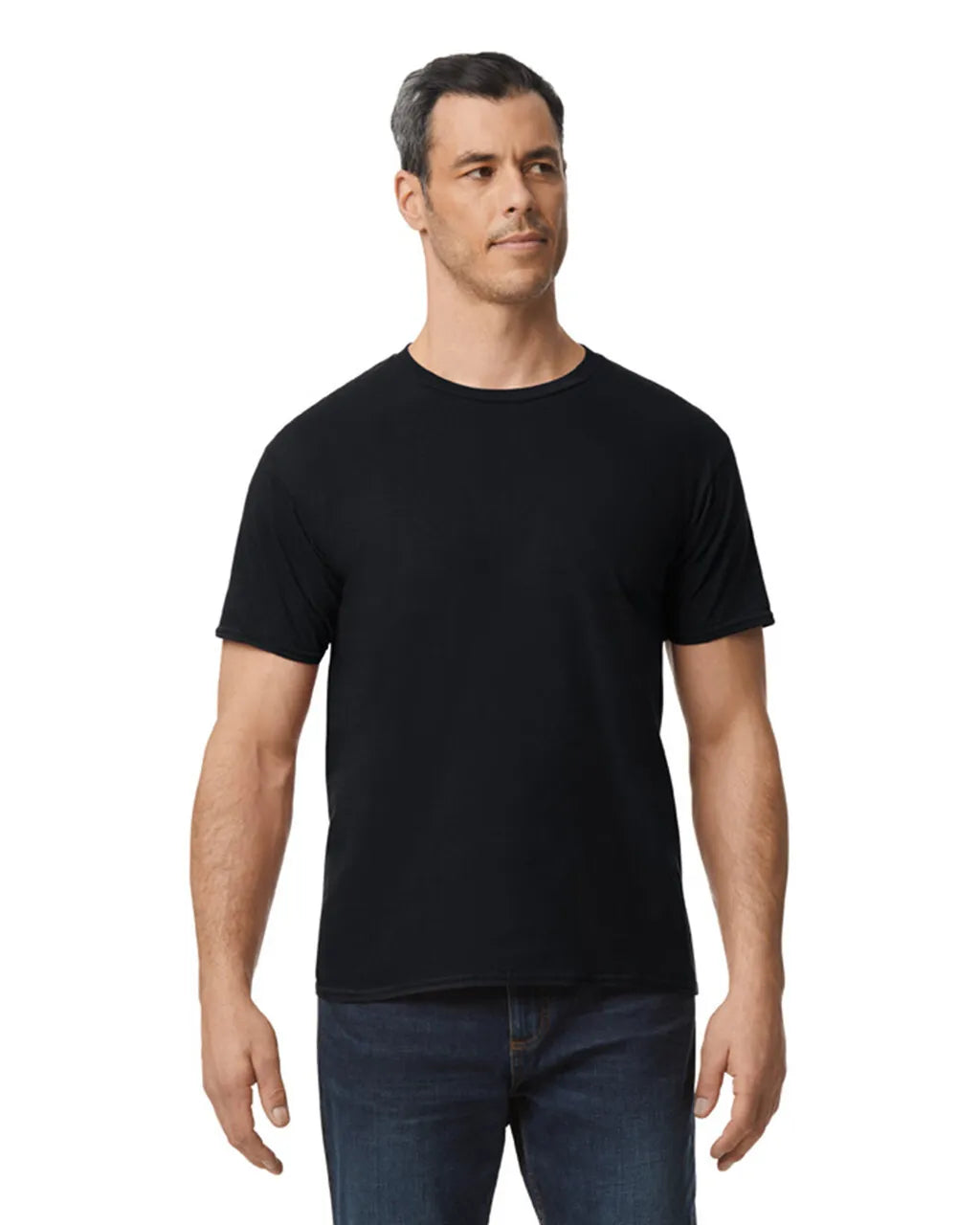 Man wearing a black Gildan 76000 T-shirt with jeans, standing casually and looking to the side-black